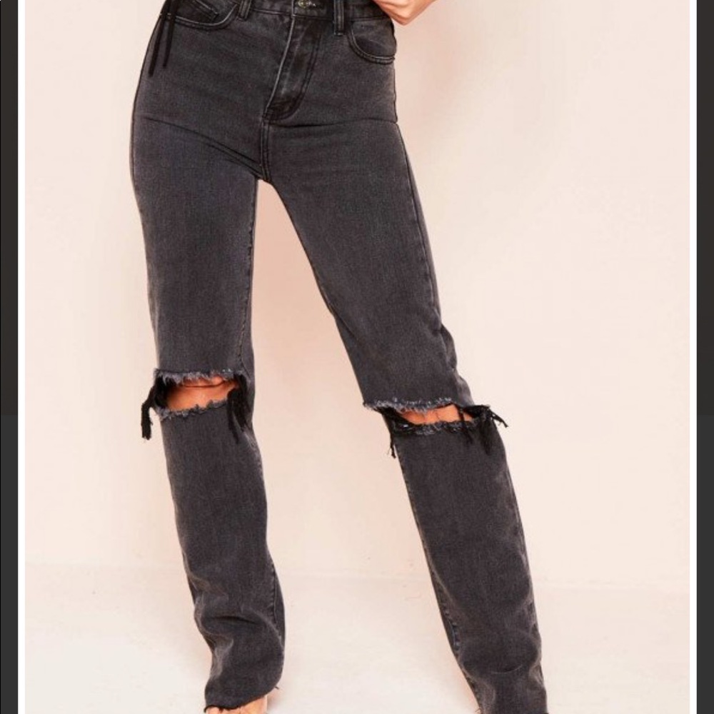 Black ripped knee denim jeans